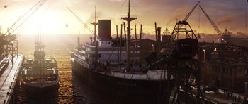 Movie still from “The Adventures of Tintin” (2011), directed by Steven Spielberg – A large boat in a body of water; Extreme Wide shot, Low angle