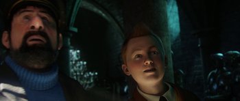 Movie still from “The Adventures of Tintin” (2011), directed by Steven Spielberg – A boy with a mohawk haircut looking up at the ceiling; Close Up shot, High angle