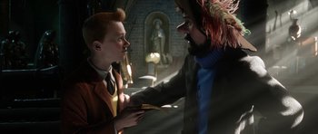 Movie still from “The Adventures of Tintin” (2011), directed by Steven Spielberg – A man and a woman are talking to each other; Medium shot, Over the shoulder angle