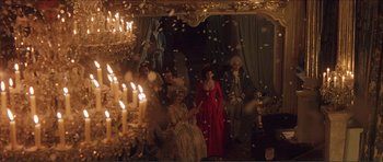 Movie still from “The Affair of the Necklace” (2001), directed by Charles Shyer – A group of people dressed in period costumes; Wide shot, High angle
