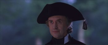 Movie still from “The Affair of the Necklace” (2001), directed by Charles Shyer – A person wearing a hat; Close Up shot, Low angle