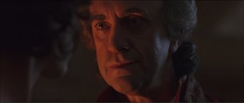 Movie still from “The Affair of the Necklace” (2001), directed by Charles Shyer – A person looking at the camera; Close Up shot, Over the shoulder angle