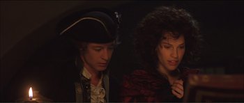 Movie still from “The Affair of the Necklace” (2001), directed by Charles Shyer – A man and a woman dressed in pirate garb; Close Up shot, High angle