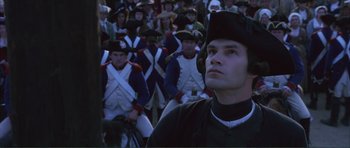 Movie still from “The Affair of the Necklace” (2001), directed by Charles Shyer – A group of men in uniforms are gathered together; Close Up shot, Low angle