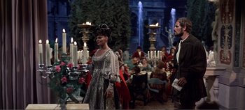 Movie still from “The Agony and the Ecstasy” (1965), directed by Carol Reed – A man and a woman dressed in medieval clothing; Wide shot, Over the shoulder angle