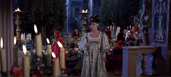 Movie still from “The Agony and the Ecstasy” (1965), directed by Carol Reed – A woman dressed as a princess in a medieval dress; Medium shot, Over the shoulder angle
