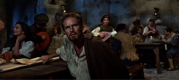 Movie still from “The Agony and the Ecstasy” (1965), directed by Carol Reed – A man with a goatee and beard standing next to another man; Medium shot, Over the shoulder angle