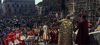 Movie still from “The Agony and the Ecstasy” (1965), directed by Carol Reed – A crowd of people dressed in medieval costumes; Extreme Wide shot, High angle