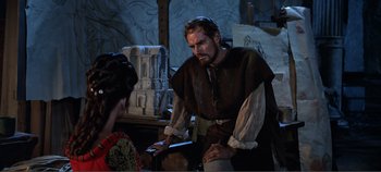 Movie still from “The Agony and the Ecstasy” (1965), directed by Carol Reed – A man and a woman in medieval garb talking; Medium shot, Over the shoulder angle