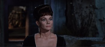 Movie still from “The Agony and the Ecstasy” (1965), directed by Carol Reed – A person wearing a dress; Close Up shot, Over the shoulder angle