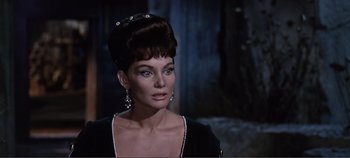 Movie still from “The Agony and the Ecstasy” (1965), directed by Carol Reed – A person wearing a dress; Close Up shot, Over the shoulder angle