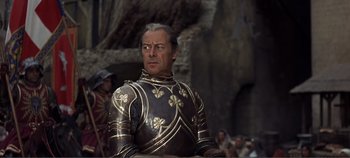 Movie still from “The Agony and the Ecstasy” (1965), directed by Carol Reed – A person wearing a suit of armor; Medium shot, Low angle