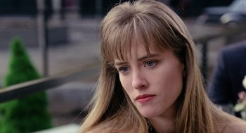 Movie still from “The Ambulance” (1990), directed by Larry Cohen – A person with long brown hair; Close Up shot, High angle