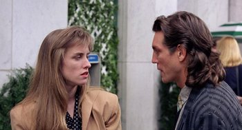 Movie still from “The Ambulance” (1990), directed by Larry Cohen – A man and a woman talking to each other; Close Up shot, Over the shoulder angle