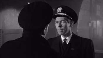 Movie still from “The Americanization of Emily” (1964), directed by Arthur Hiller – A black and white photo of a man and a woman; Close Up shot, Over the shoulder angle