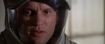 Movie still from “The Andromeda Strain” (1971), directed by Robert Wise – A person wearing a helmet; Close Up shot, Low angle
