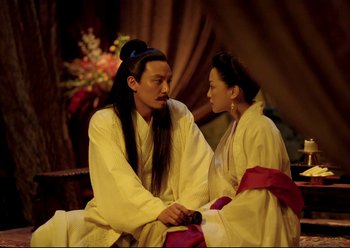 Movie still from “The Assassin” (2015), directed by Hsiao-Hsien Hou – A man and a woman dressed in traditional chinese clothing; Medium shot, Low angle