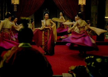 Movie still from “The Assassin” (2015), directed by Hsiao-Hsien Hou – A group of women in traditional dress dancing; Wide shot, High angle