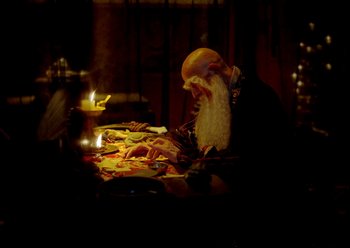 Movie still from “The Assassin” (2015), directed by Hsiao-Hsien Hou – An old man sitting in front of a table with food on top of it; Medium shot, High angle