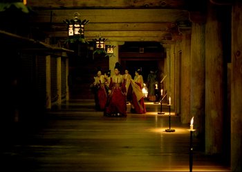 Movie still from “The Assassin” (2015), directed by Hsiao-Hsien Hou – A group of women dressed in red and white are standing in a hallway; Extreme Wide shot, Low angle