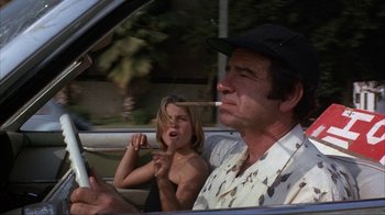 Movie still from “The Bad News Bears” (1976), directed by Michael Ritchie – A man and a child in the back of a car; Close Up shot, Low angle