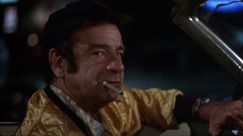 Movie still from “The Bad News Bears” (1976), directed by Michael Ritchie – A person with a cigarette in his mouth; Close Up shot, Low angle