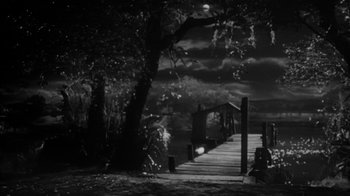 Movie still from “The Bad Seed” (1956), directed by Mervyn LeRoy – A black - and - white photo of a dock and a tree; Extreme Wide shot, High angle