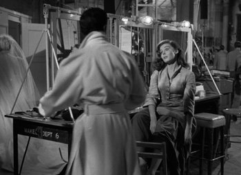 Movie still from “The Bad and the Beautiful” (1952), directed by Vincente Minnelli – A man and a woman sitting in front of a mirror; Medium shot, Over the shoulder angle