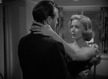 Movie still from “The Bad and the Beautiful” (1952), directed by Vincente Minnelli – A man and a woman are standing together in a room; Close Up shot, Over the shoulder angle