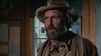 Movie still from “The Ballad of Cable Hogue” (1970), directed by Sam Peckinpah – An old man with a beard and a hat; Close Up shot, Low angle