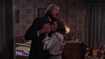 Movie still from “The Ballad of Cable Hogue” (1970), directed by Sam Peckinpah – A man and a woman embracing in a room; Medium shot, Low angle