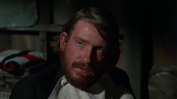 Movie still from “The Ballad of Cable Hogue” (1970), directed by Sam Peckinpah – A person with a beard; Close Up shot, Over the shoulder angle