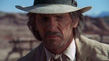 Movie still from “The Ballad of Cable Hogue” (1970), directed by Sam Peckinpah – A man with a hat and a mustache; Close Up shot, Low angle