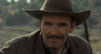Movie still from “The Ballad of Gregorio Cortez” (1982), directed by Robert M. Young – A person wearing a cowboy hat; Close Up shot, Low angle