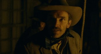 Movie still from “The Ballad of Gregorio Cortez” (1982), directed by Robert M. Young – A person wearing a cowboy hat; Close Up shot, Low angle