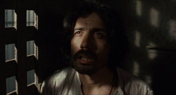 Movie still from “The Ballad of Gregorio Cortez” (1982), directed by Robert M. Young – A person with long black hair; Close Up shot, Low angle