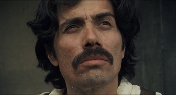 Movie still from “The Ballad of Gregorio Cortez” (1982), directed by Robert M. Young – A person with a mustache; Close Up shot, Low angle