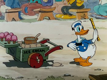 Movie still from “The Band Concert” (1935), directed by Wilfred Jackson – A painting of donald duck with a cart of ice cream; Wide shot, High angle