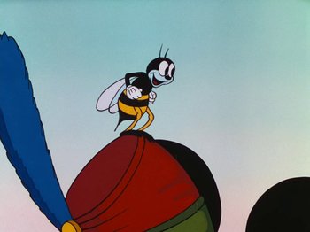 Movie still from “The Band Concert” (1935), directed by Wilfred Jackson – A cartoon of a bee sitting on top of an object; Medium shot, Low angle