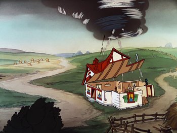 Movie still from “The Band Concert” (1935), directed by Wilfred Jackson – A cartoon of a house with a black cloud coming from it; Extreme Wide shot, Low angle