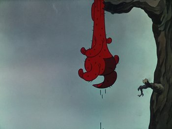 Movie still from “The Band Concert” (1935), directed by Wilfred Jackson – A man falling off of a cliff while a red object is hanging from the side of the cliff; Wide shot, Low angle