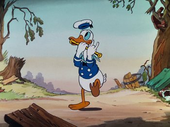 Movie still from “The Band Concert” (1935), directed by Wilfred Jackson – A cartoon of donald duck wearing a sailor's uniform; Medium shot, Low angle