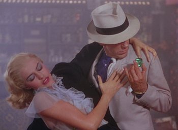 Movie still from “The Band Wagon” (1953), directed by Vincente Minnelli – A man and a woman are dancing together; Medium shot, Overhead angle