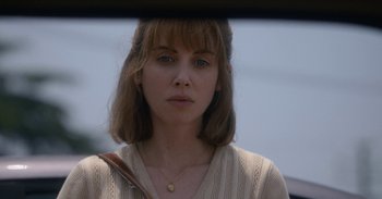 Movie still from “Horse Girl” (2020), directed by Jeff Baena – A person wearing a sweater; Close Up shot, Low angle