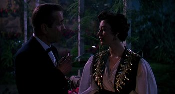Movie still from “The Barefoot Contessa” (1954), directed by Joseph L. Mankiewicz – A man and a woman talking to each other; Medium shot, Over the shoulder angle