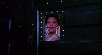Movie still from “The Barefoot Contessa” (1954), directed by Joseph L. Mankiewicz – A picture of a woman's face in a mirror; Close Up shot, Low angle