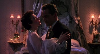 Movie still from “The Barefoot Contessa” (1954), directed by Joseph L. Mankiewicz – A man and a woman are dancing in a room; Medium shot, Low angle