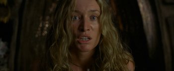 Movie still from “The Beach” (2000), directed by Danny Boyle – A person with long blonde hair; Close Up shot, Low angle