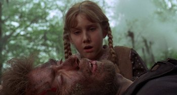 Movie still from “The Beguiled” (1971), directed by Don Siegel – A young girl looking at an old man's face; Close Up shot, Over the shoulder angle