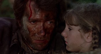 Movie still from “The Beguiled” (1971), directed by Don Siegel – A man and a young girl face to face; Close Up shot, Over the shoulder angle